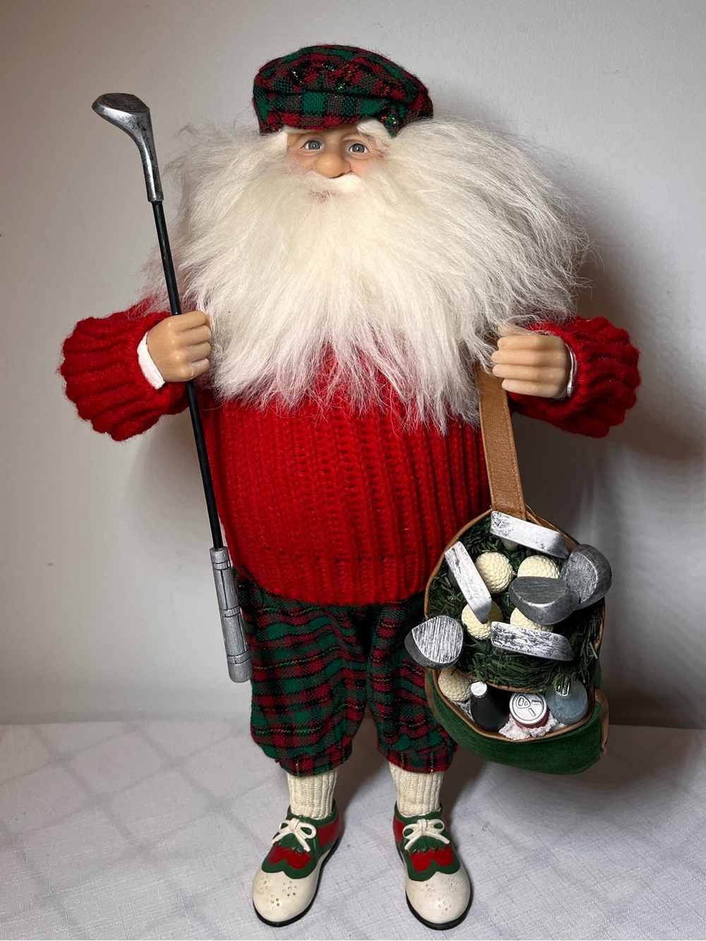 Golfing Santa is a holiday item
Playful, sporty twist to usual Xmas decor!